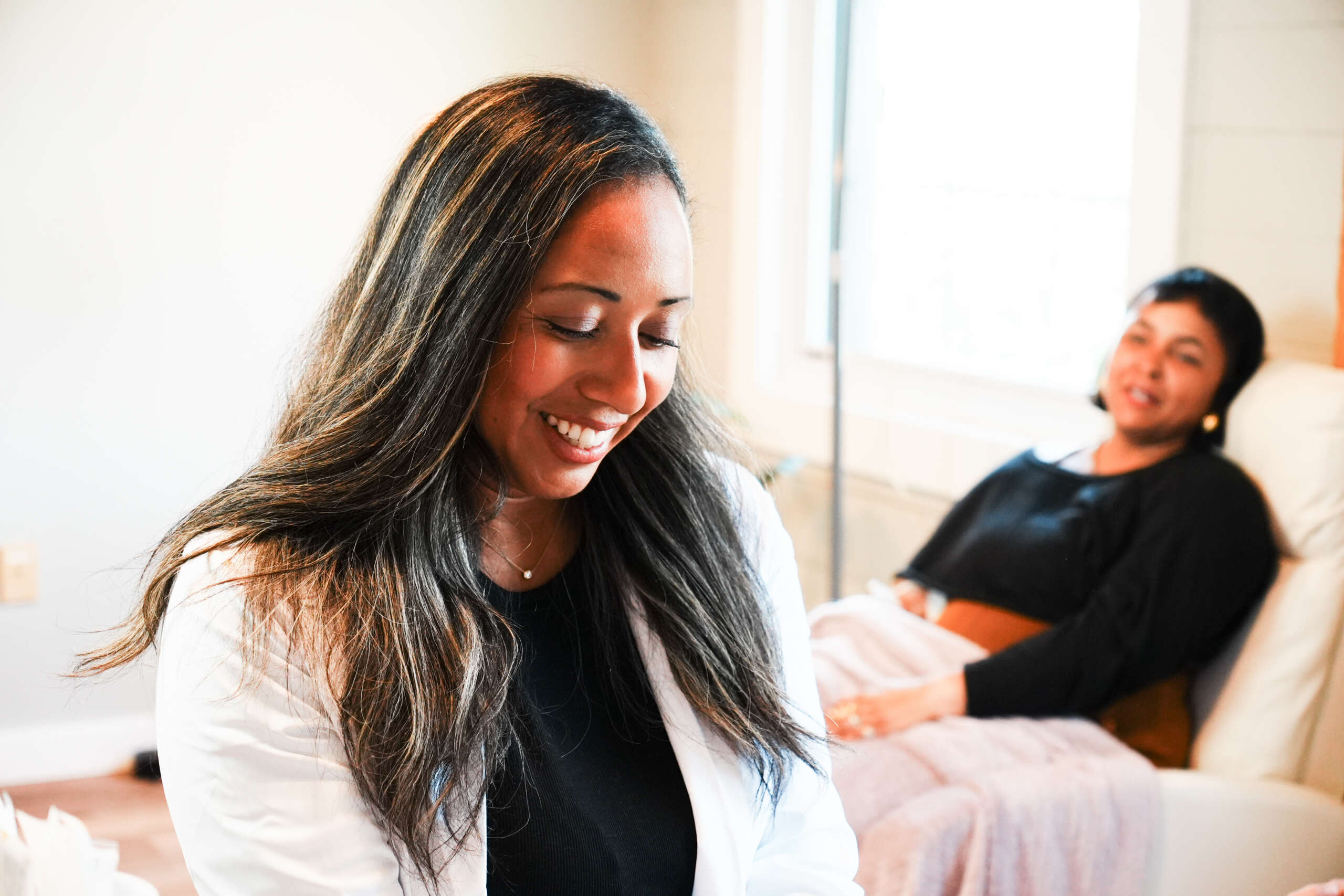 Naturopathic doctor with a chronic illness patient during a consultation at Bendavid Clinic in Burlington, Vermont